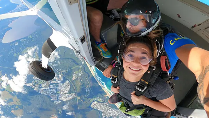 Jumping out of the plane for a noosa skydive